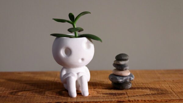 Studio Ghibli inspired Kodama planter Kerra with small plant